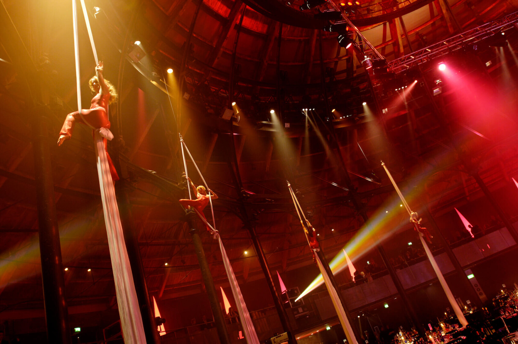 Four performers on silks