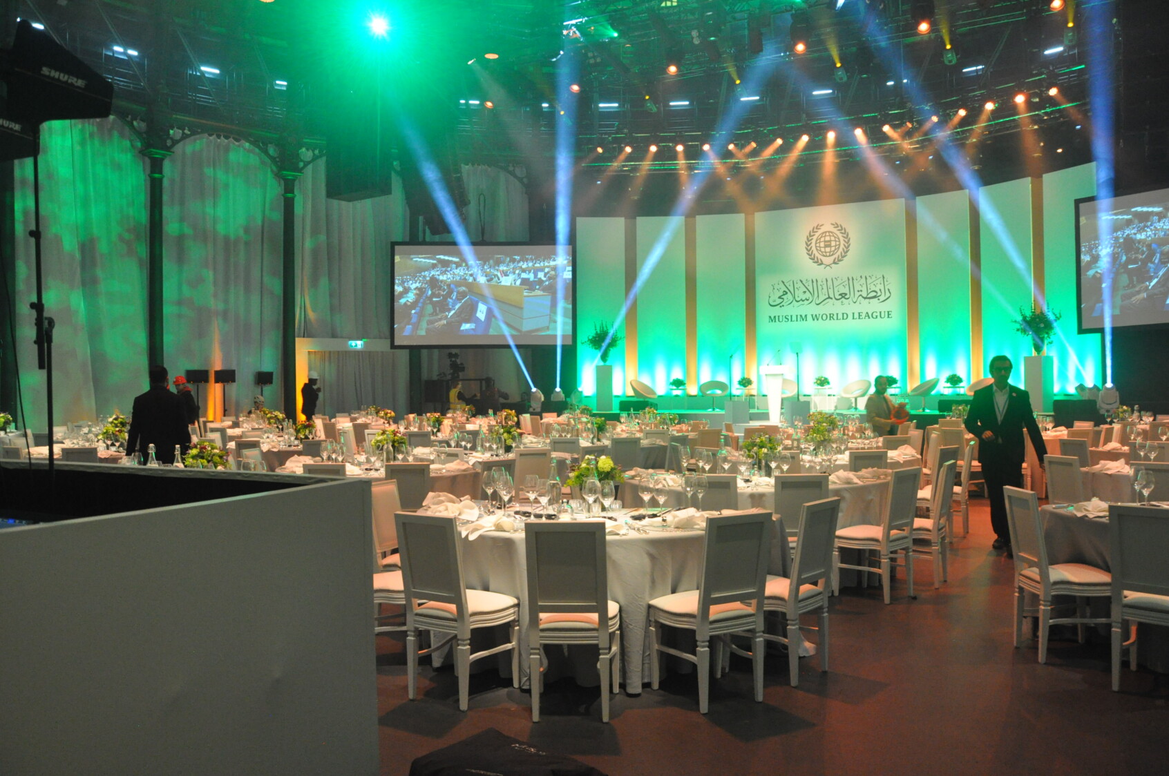 Roundhouse Main Space set up with tables for a Muslim World League event