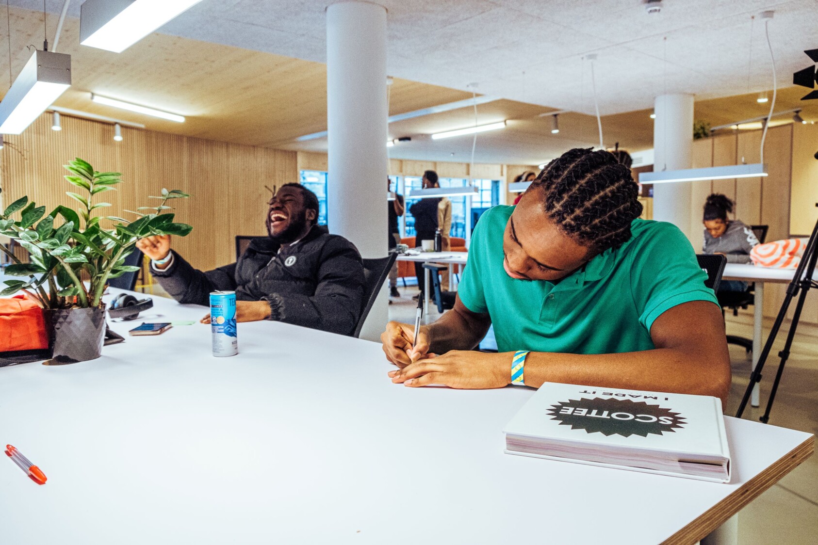 two people working at a large table