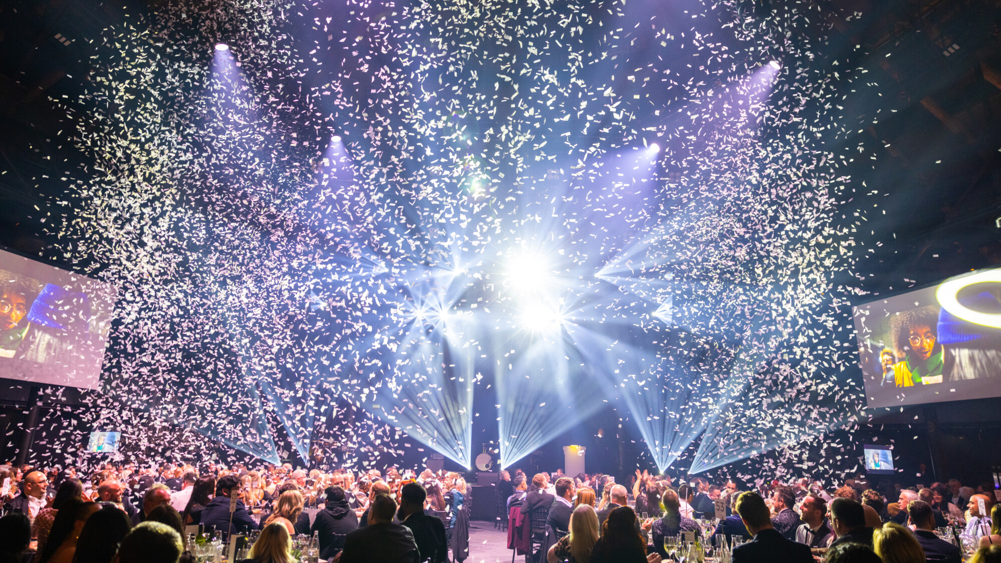 Confetti drop at Camelot's Christmas Party in the Roundhouse Main Space