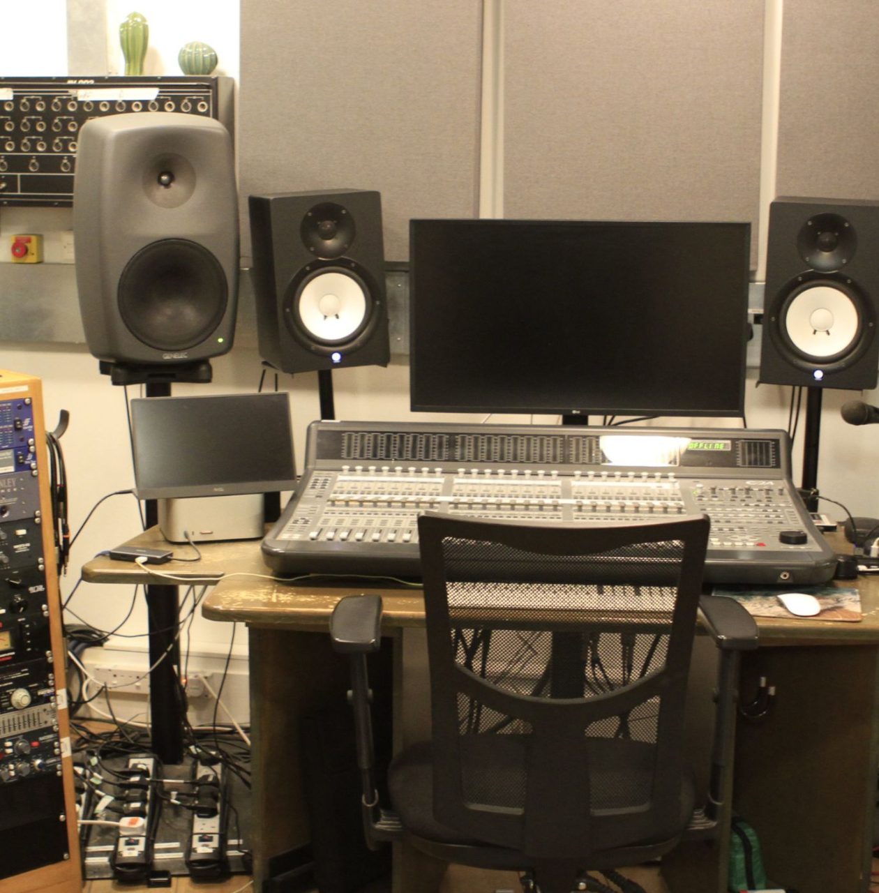 a recording studio mixing desk