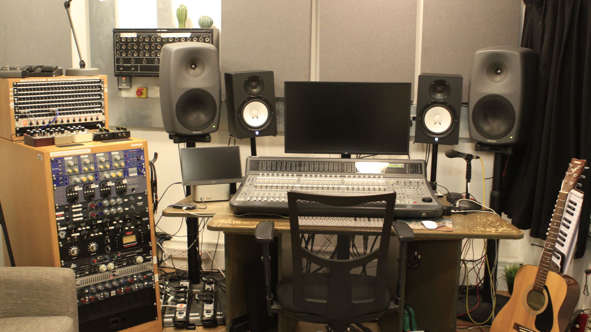 a recording studio mixing desk