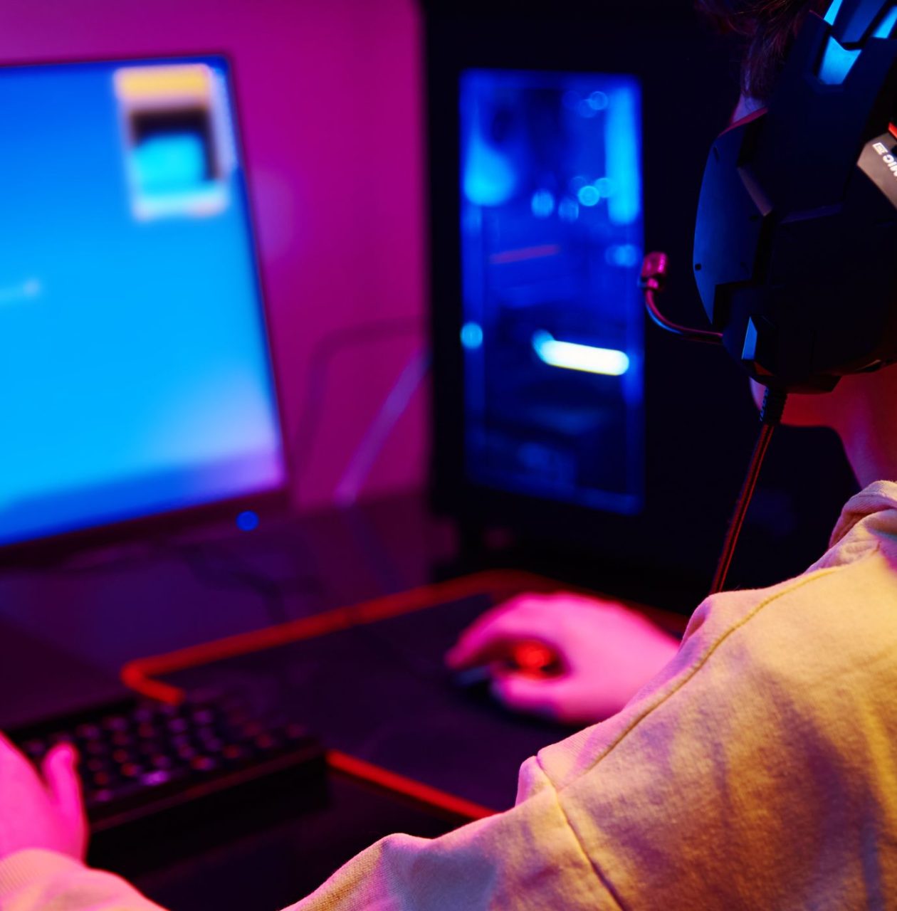 a young person creating a game on a laptop